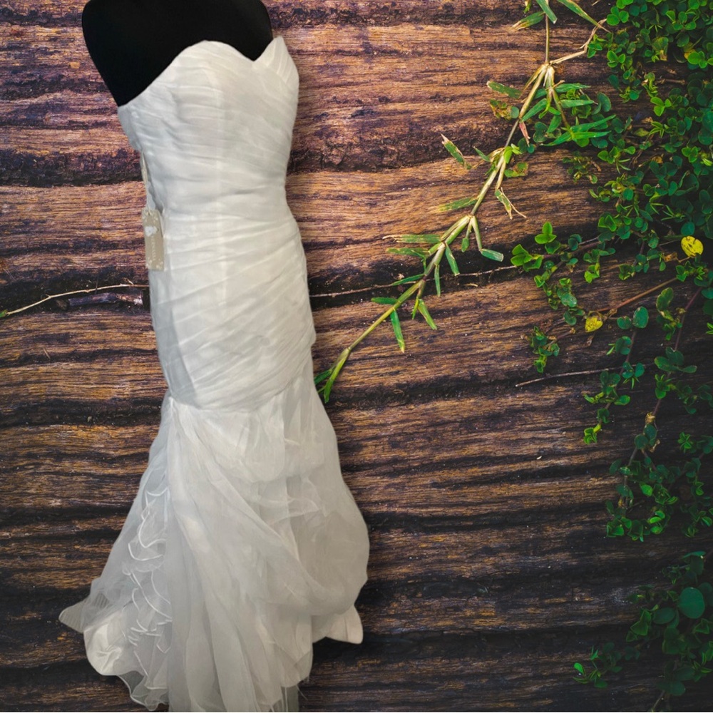 NWT Vernassa brand mermaid style wedding dress. Never altered. Never worn.